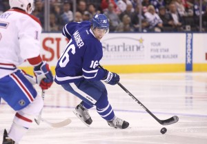 Oct 2, 2016; Toronto, Ontario, CAN; Toronto Maple Leafs forward Mitch Marner (16) controls the puck against the Montreal Canadiens during a preseason hockey game at Air Canada Centre. The Maple Leafs beat the Canadiens 3-2 in overtime. Mandatory Credit: Tom Szczerbowski-USA TODAY Sports