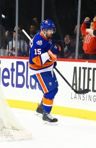 Jan 3, 2016; Brooklyn, NY, USA; New York Islanders right wing Cal Clutterbuck (15) reacts after scoring a goal against the Dallas Stars during the second period at Barclays Center. Mandatory Credit: Andy Marlin-USA TODAY Sports