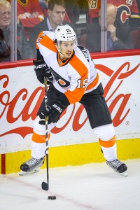 Nov 5, 2015; Calgary, Alberta, CAN; Philadelphia Flyers defenseman Michael Del Zotto (15) controls the puck against the Calgary Flames during the third period at Scotiabank Saddledome. Calgary Flames won 2-1. Mandatory Credit: Sergei Belski-USA TODAY Sports