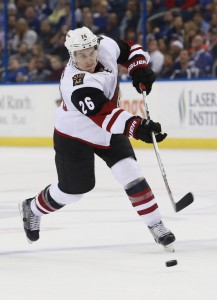 Feb 23, 2016; Tampa, FL, USA; Arizona Coyotes defenseman Michael Stone (26) shoots against the Tampa Bay Lightning during the third period at Amalie Arena. Mandatory Credit: Kim Klement-USA TODAY Sports