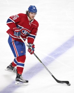 Apr 7, 2017; Montreal, Quebec, CAN; Montreal Canadiens defenseman Nathan Beaulieu (28) makes a pass against Tampa Bay Lightning during the second period at Bell Centre. Mandatory Credit: Jean-Yves Ahern-USA TODAY Sports