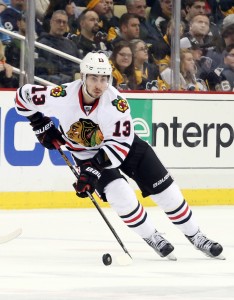 Mar 29, 2017; Pittsburgh, PA, USA; Chicago Blackhawks left wing Tomas Jurco (13) caries the puck up ice against the Pittsburgh Penguins during the third period at the PPG PAINTS Arena. Chicago won 5-1. Mandatory Credit: Charles LeClaire-USA TODAY Sports