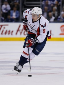 Apr 19, 2017; Toronto, Ontario, CAN; Washington Capitals defenseman Dmitry Orlov (9) carries the puck against the Toronto Maple Leafs in game four of the first round of the 2017 Stanley Cup Playoffs at Air Canada Centre. Washington defeated Toronto 5-4. Mandatory Credit: John E. Sokolowski-USA TODAY Sports