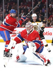 Dec 12, 2016; Montreal, Quebec, CAN; Montreal Canadiens goalie Carey Price (31) makes a save against Boston Bruins as defenseman Shea Weber (6) defends and right wing David Backes (42) during the second period at Bell Centre. Mandatory Credit: Jean-Yves Ahern-USA TODAY Sports