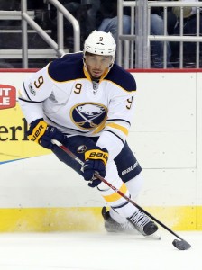 Mar 5, 2017; Pittsburgh, PA, USA; Buffalo Sabres left wing Evander Kane (9) skates with the puck against the Pittsburgh Penguins during the first period at the PPG PAINTS Arena. The Penguins won 4-3. Mandatory Credit: Charles LeClaire-USA TODAY Sports